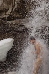 Scott in a waterfall along Whiterabbit Creek
